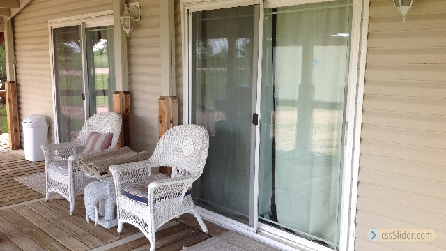 Great Sitting Area with Sliding Glass doors!